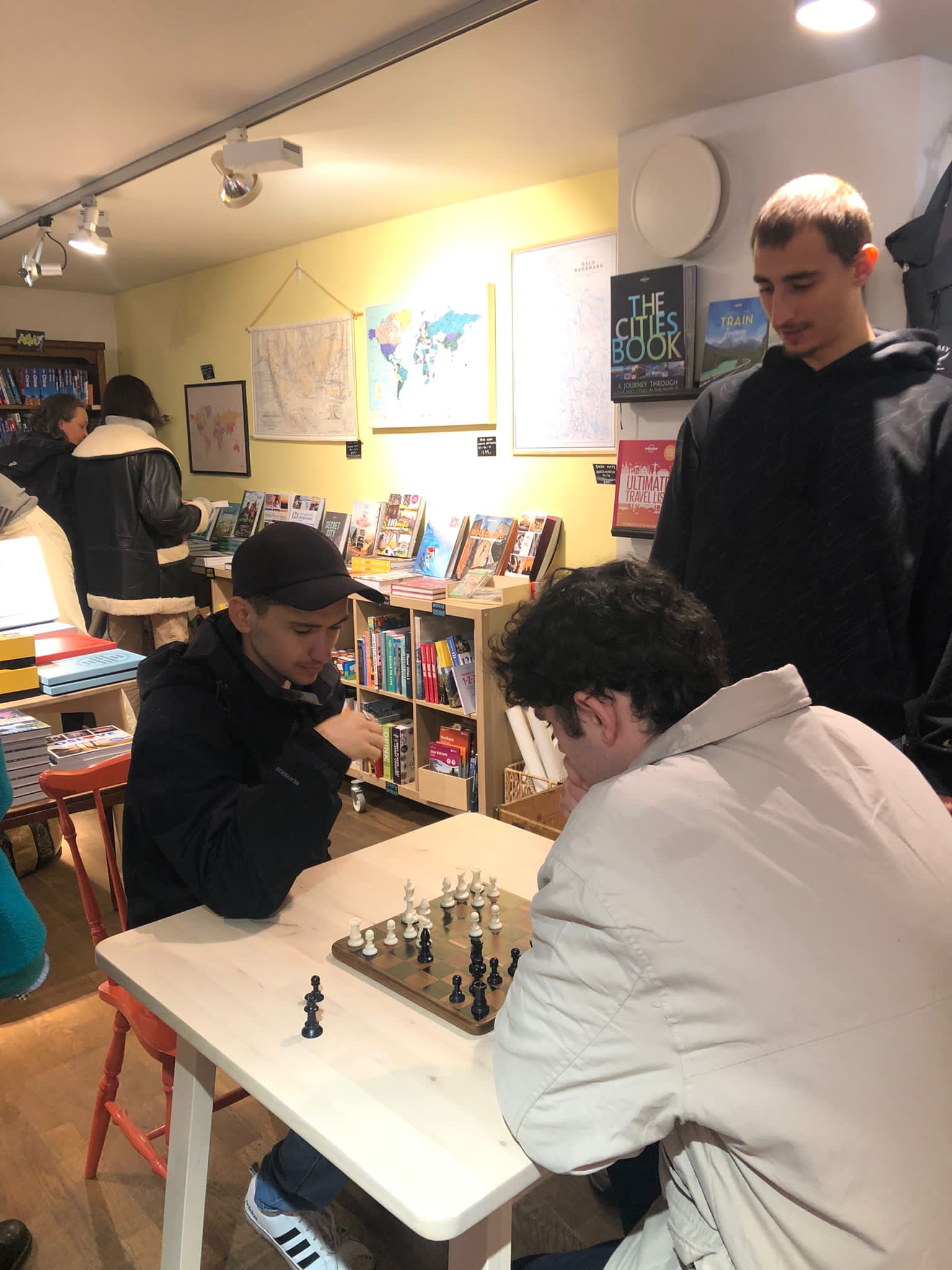 Playing an over-the-board chess game in an Oslo bookstore