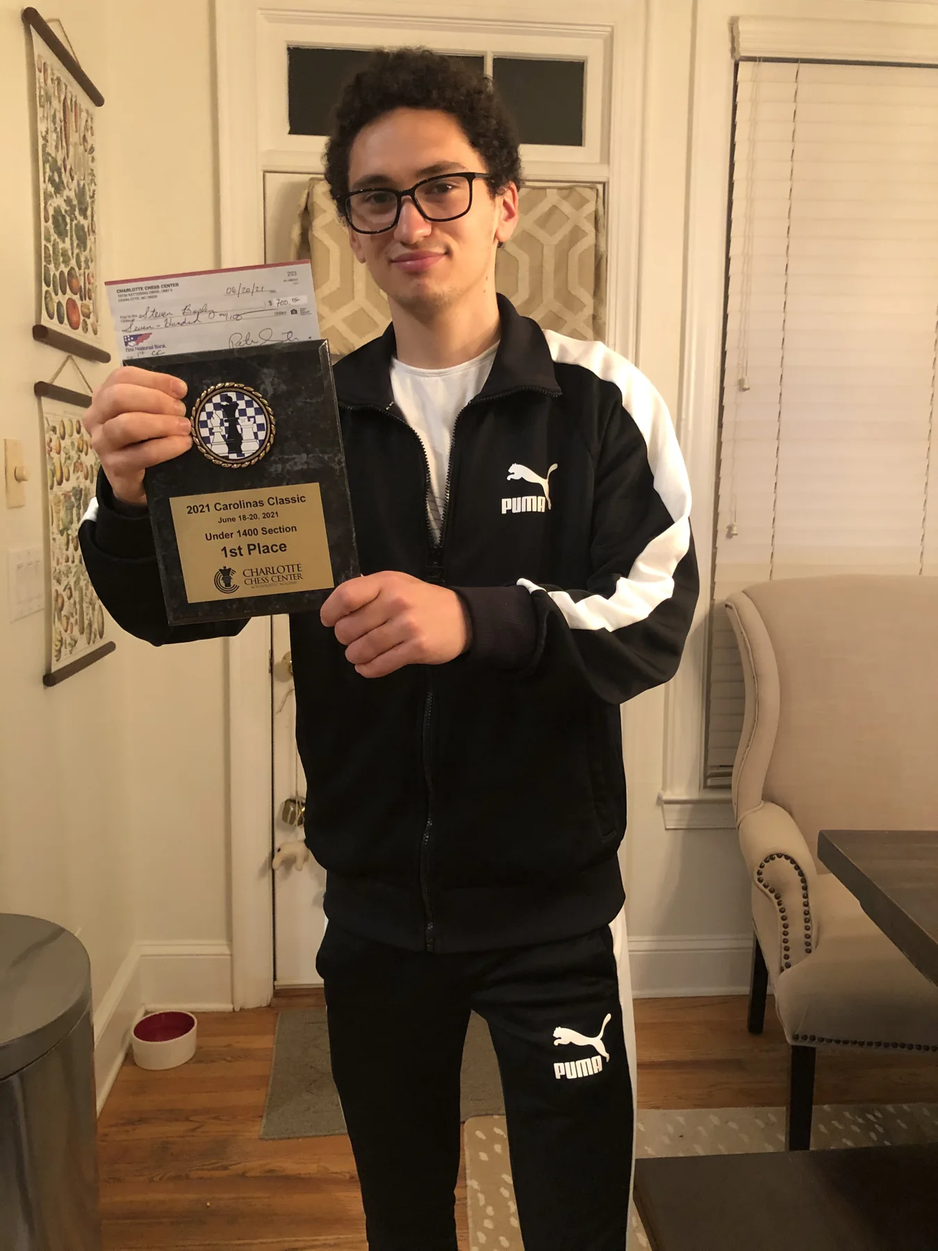 Holding a first-place trophy from the 2021 Carolinas Classic